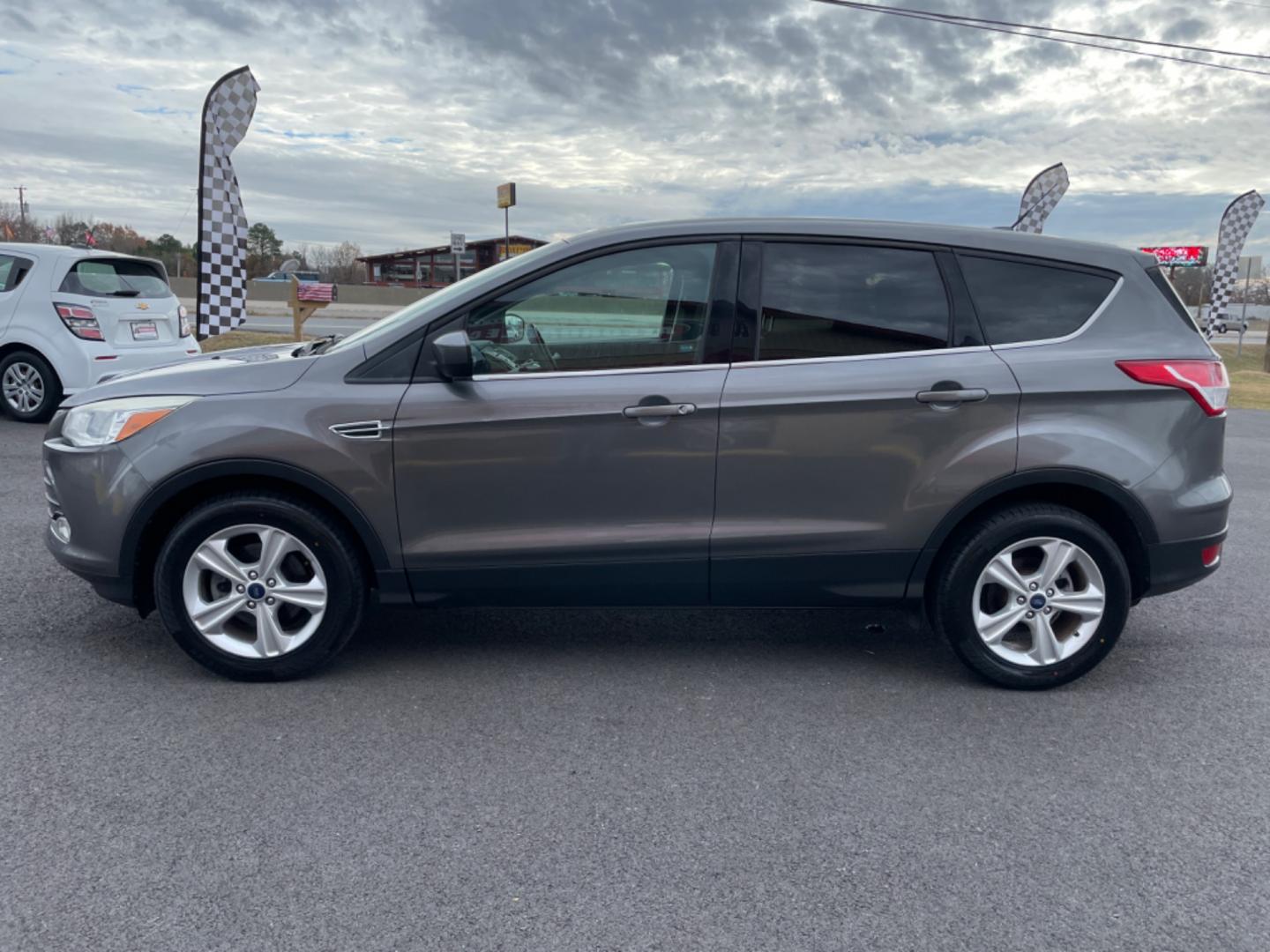 2013 Gray Ford Escape (1FMCU0GX1DU) with an 4-Cyl, EcoBoost, 1.6L engine, Auto, 6-Spd w/SelShft transmission, located at 8008 Warden Rd, Sherwood, AR, 72120, (501) 801-6100, 34.830078, -92.186684 - Photo#4